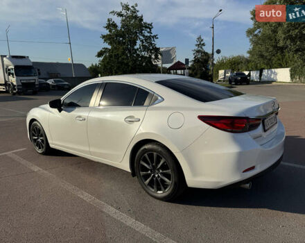Білий Мазда 6, об'ємом двигуна 2 л та пробігом 145 тис. км за 17000 $, фото 8 на Automoto.ua