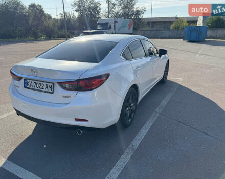 Білий Мазда 6, об'ємом двигуна 2 л та пробігом 145 тис. км за 17000 $, фото 6 на Automoto.ua