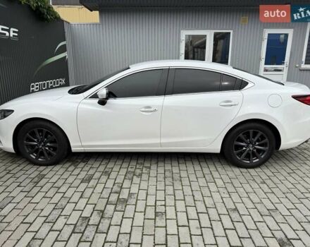 Білий Мазда 6, об'ємом двигуна 2 л та пробігом 145 тис. км за 12900 $, фото 30 на Automoto.ua
