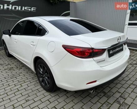 Білий Мазда 6, об'ємом двигуна 2 л та пробігом 145 тис. км за 12900 $, фото 35 на Automoto.ua