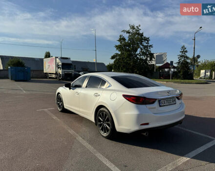 Білий Мазда 6, об'ємом двигуна 2 л та пробігом 145 тис. км за 17000 $, фото 9 на Automoto.ua