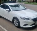 Белый Мазда 6, объемом двигателя 2 л и пробегом 115 тыс. км за 11900 $, фото 1 на Automoto.ua
