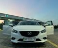 Білий Мазда 6, об'ємом двигуна 2 л та пробігом 121 тис. км за 11700 $, фото 12 на Automoto.ua