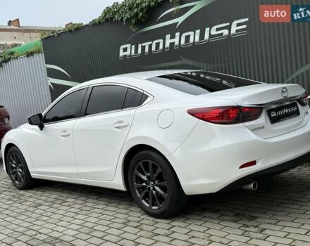 Білий Мазда 6, об'ємом двигуна 2 л та пробігом 145 тис. км за 12900 $, фото 21 на Automoto.ua