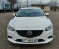 Белый Мазда 6, объемом двигателя 2.49 л и пробегом 142 тыс. км за 12054 $, фото 1 на Automoto.ua