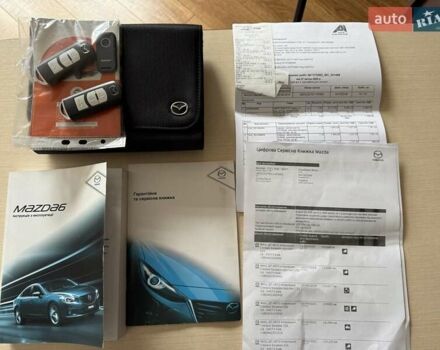 Білий Мазда 6, об'ємом двигуна 2 л та пробігом 145 тис. км за 12900 $, фото 74 на Automoto.ua