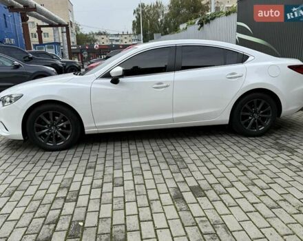 Білий Мазда 6, об'ємом двигуна 2 л та пробігом 145 тис. км за 12900 $, фото 20 на Automoto.ua