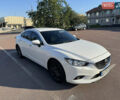 Білий Мазда 6, об'ємом двигуна 2 л та пробігом 145 тис. км за 17000 $, фото 1 на Automoto.ua