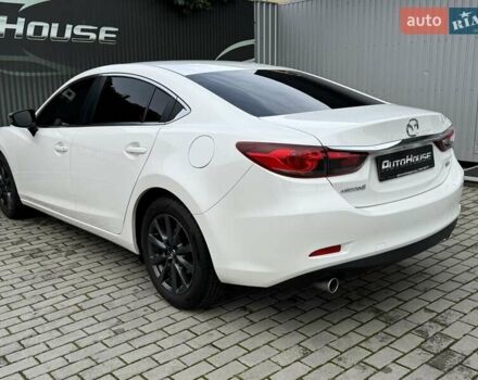 Білий Мазда 6, об'ємом двигуна 2 л та пробігом 145 тис. км за 12900 $, фото 32 на Automoto.ua