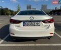 Білий Мазда 6, об'ємом двигуна 2 л та пробігом 209 тис. км за 12450 $, фото 4 на Automoto.ua