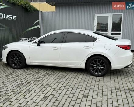 Білий Мазда 6, об'ємом двигуна 2 л та пробігом 145 тис. км за 12900 $, фото 31 на Automoto.ua