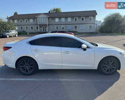 Білий Мазда 6, об'ємом двигуна 2 л та пробігом 145 тис. км за 17000 $, фото 2 на Automoto.ua