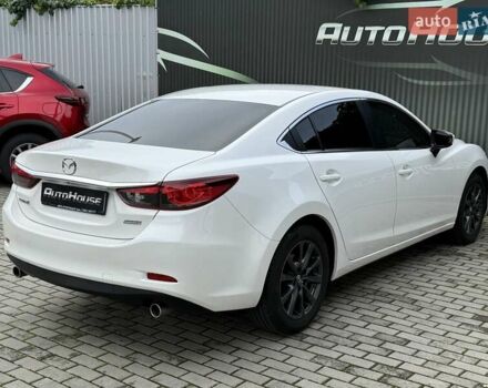 Білий Мазда 6, об'ємом двигуна 2 л та пробігом 145 тис. км за 12900 $, фото 26 на Automoto.ua