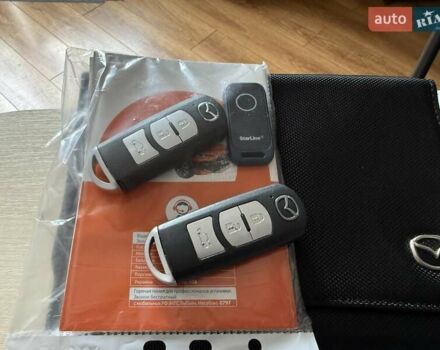 Білий Мазда 6, об'ємом двигуна 2 л та пробігом 145 тис. км за 12900 $, фото 75 на Automoto.ua