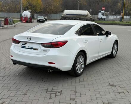 Білий Мазда 6, об'ємом двигуна 2.5 л та пробігом 118 тис. км за 12999 $, фото 6 на Automoto.ua