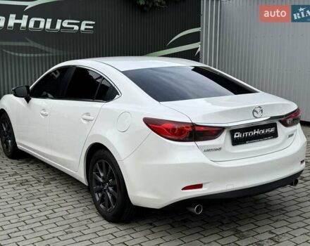 Білий Мазда 6, об'ємом двигуна 2 л та пробігом 145 тис. км за 12900 $, фото 29 на Automoto.ua
