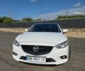 Белый Мазда 6, объемом двигателя 2 л и пробегом 195 тыс. км за 11544 $, фото 1 на Automoto.ua