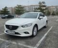 Белый Мазда 6, объемом двигателя 2 л и пробегом 225 тыс. км за 11700 $, фото 1 на Automoto.ua