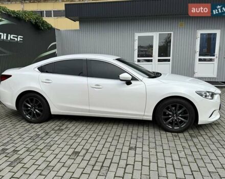 Білий Мазда 6, об'ємом двигуна 2 л та пробігом 145 тис. км за 12900 $, фото 19 на Automoto.ua