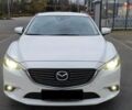 Белый Мазда 6, объемом двигателя 2.5 л и пробегом 190 тыс. км за 11000 $, фото 1 на Automoto.ua