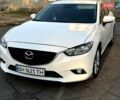 Белый Мазда 6, объемом двигателя 2 л и пробегом 79 тыс. км за 13500 $, фото 1 на Automoto.ua