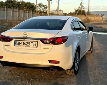 Белый Мазда 6, объемом двигателя 2 л и пробегом 79 тыс. км за 13100 $, фото 1 на Automoto.ua
