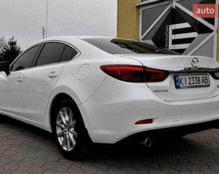 Білий Мазда 6, об'ємом двигуна 2.19 л та пробігом 117 тис. км за 11999 $, фото 12 на Automoto.ua