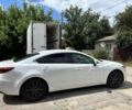 Белый Мазда 6, объемом двигателя 2.2 л и пробегом 210 тыс. км за 12988 $, фото 2 на Automoto.ua