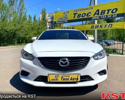 Белый Мазда 6, объемом двигателя 2.5 л и пробегом 209 тыс. км за 13500 $, фото 1 на Automoto.ua