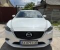 Белый Мазда 6, объемом двигателя 2.2 л и пробегом 210 тыс. км за 12988 $, фото 1 на Automoto.ua
