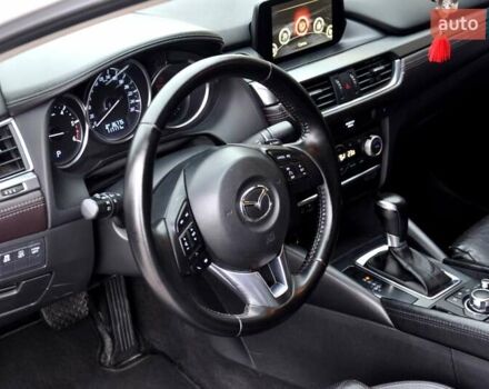 Білий Мазда 6, об'ємом двигуна 2.19 л та пробігом 117 тис. км за 11999 $, фото 17 на Automoto.ua