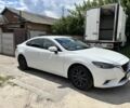 Белый Мазда 6, объемом двигателя 2.2 л и пробегом 210 тыс. км за 12988 $, фото 1 на Automoto.ua