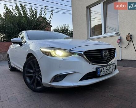 Белый Мазда 6, объемом двигателя 2.49 л и пробегом 200 тыс. км за 16000 $, фото 1 на Automoto.ua