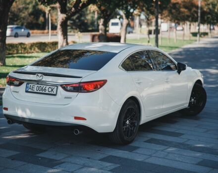 Белый Мазда 6, объемом двигателя 2.5 л и пробегом 106 тыс. км за 13000 $, фото 1 на Automoto.ua