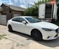 Білий Мазда 6, об'ємом двигуна 2.19 л та пробігом 210 тис. км за 12999 $, фото 2 на Automoto.ua