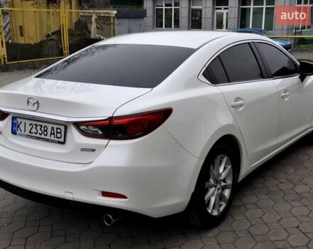 Білий Мазда 6, об'ємом двигуна 2.19 л та пробігом 117 тис. км за 11999 $, фото 7 на Automoto.ua