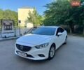 Белый Мазда 6, объемом двигателя 2 л и пробегом 108 тыс. км за 17000 $, фото 1 на Automoto.ua