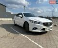 Білий Мазда 6, об'ємом двигуна 2.19 л та пробігом 66 тис. км за 15000 $, фото 4 на Automoto.ua