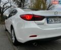 Білий Мазда 6, об'ємом двигуна 2 л та пробігом 204 тис. км за 13000 $, фото 12 на Automoto.ua