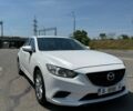Белый Мазда 6, объемом двигателя 2.49 л и пробегом 145 тыс. км за 10000 $, фото 1 на Automoto.ua