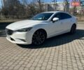 Белый Мазда 6, объемом двигателя 2.49 л и пробегом 180 тыс. км за 14750 $, фото 1 на Automoto.ua
