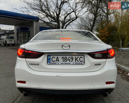 Білий Мазда 6, об'ємом двигуна 2 л та пробігом 200 тис. км за 15200 $, фото 11 на Automoto.ua
