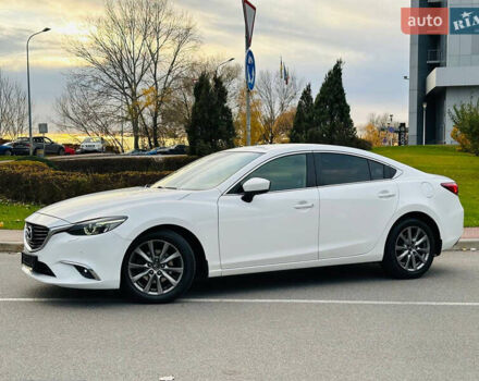 Белый Мазда 6, объемом двигателя 2.49 л и пробегом 103 тыс. км за 16999 $, фото 1 на Automoto.ua