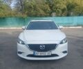 Белый Мазда 6, объемом двигателя 2.49 л и пробегом 124 тыс. км за 13000 $, фото 1 на Automoto.ua