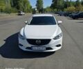 Белый Мазда 6, объемом двигателя 2 л и пробегом 204 тыс. км за 11800 $, фото 1 на Automoto.ua