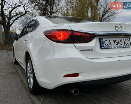 Білий Мазда 6, об'ємом двигуна 2 л та пробігом 200 тис. км за 15200 $, фото 12 на Automoto.ua