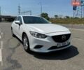 Белый Мазда 6, объемом двигателя 2.49 л и пробегом 145 тыс. км за 10000 $, фото 1 на Automoto.ua
