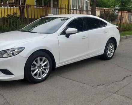 Белый Мазда 6, объемом двигателя 2.49 л и пробегом 75 тыс. км за 14500 $, фото 1 на Automoto.ua