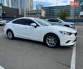 Білий Мазда 6, об'ємом двигуна 2 л та пробігом 183 тис. км за 12900 $, фото 13 на Automoto.ua