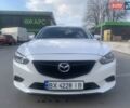 Белый Мазда 6, объемом двигателя 2.49 л и пробегом 170 тыс. км за 11900 $, фото 1 на Automoto.ua